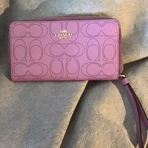 Coach Pink Wallet with Signature Logo and Zip-Around Closure